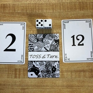 kaart- en dobbelspel genaamd Toss & Turn