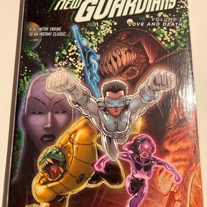 May include: Green Lantern New Guardians Volume 3: Love and Death comic book cover featuring a group of superheroes in action. The cover art is a colorful illustration with a dark background and a variety of characters, including a green lantern, a purple lantern, and a yellow lantern.