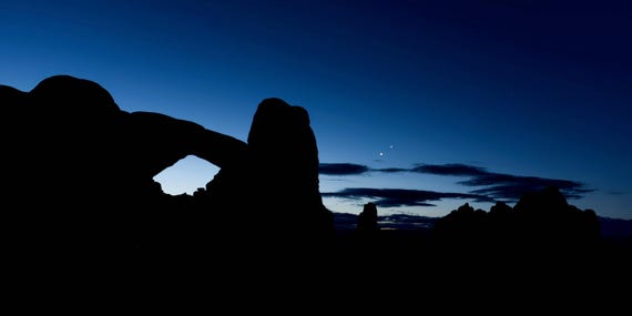 Venus and Jupiter Rise Over the Red Rock Desert