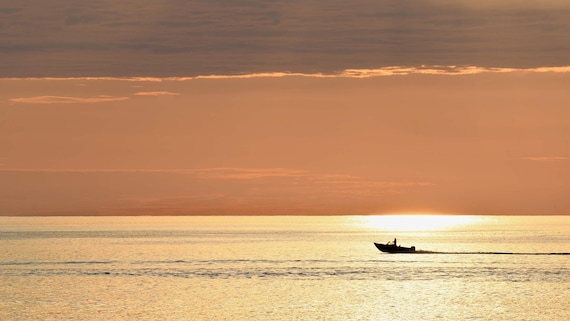 Lone Fisherman at Dawn
