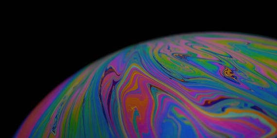 Liquid Planets (Three Worlds of Swirling Color)