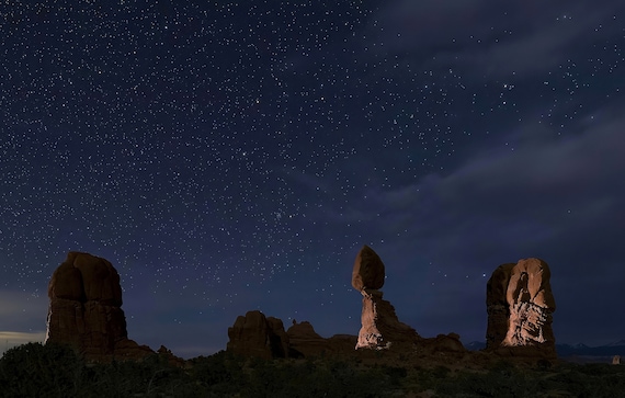 Light Plays on the Balanced Rock Formation at Arches National Park, Utah