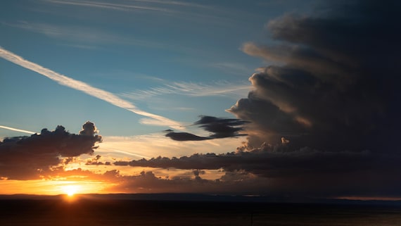 Sunset With Massive Looming Clouds