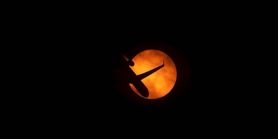 Jet Across the Setting Sun