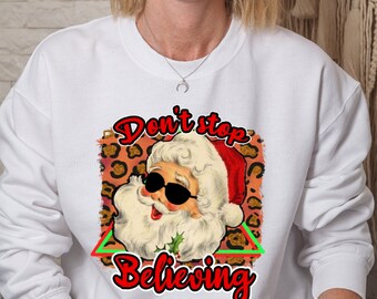 Don't Stop Believing Sweatshirt, Santa Claus Sweatshirt, Motivational Christmas Tee, Funny Christmas Crewneck, Gift For Christmas Family