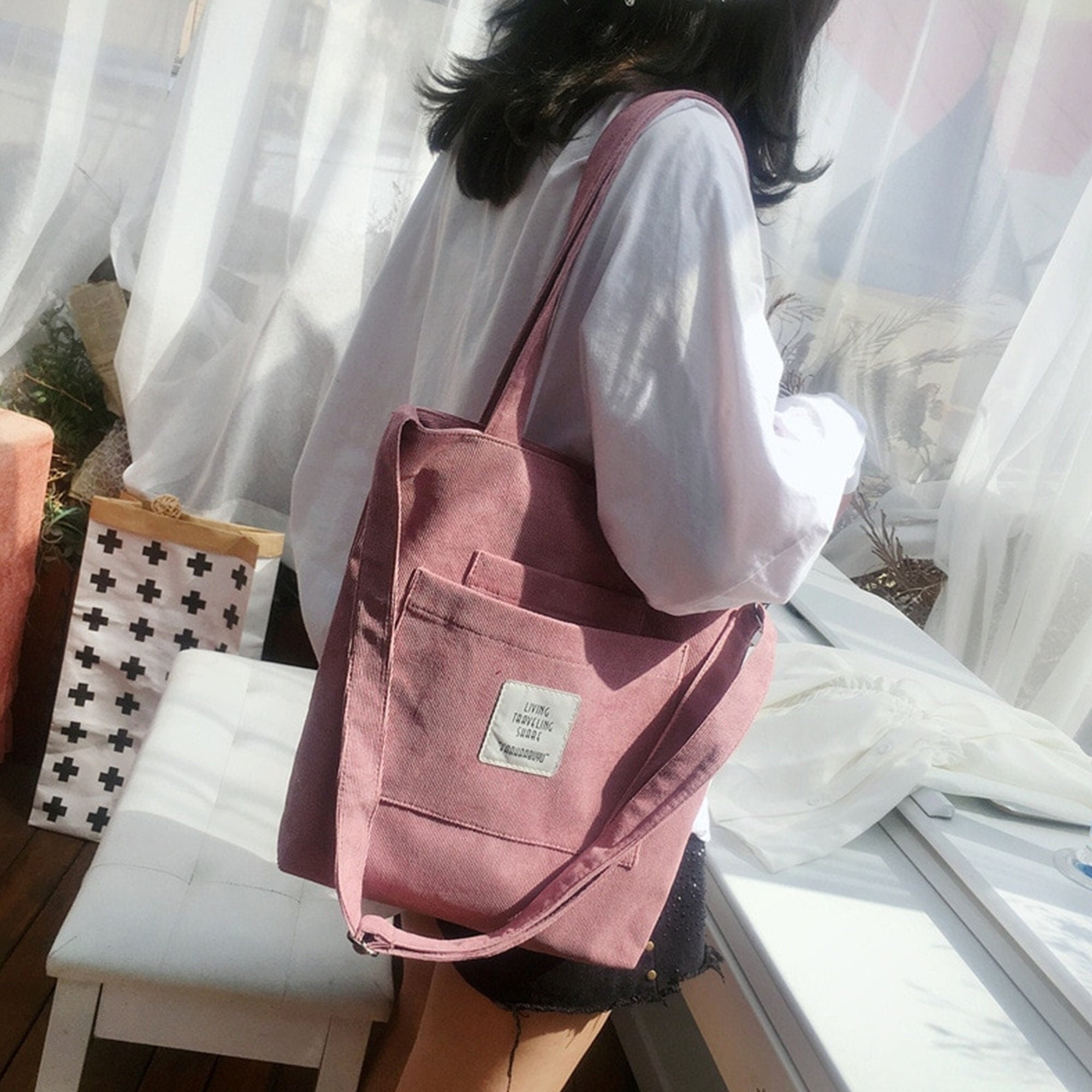 living traveling share crossbody