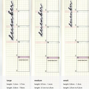 May include: Three vertical planner stickers with the word December in black cursive script, displayed on a grid calendar page. The large sticker is 1.2cm to 1.7cm high and 3.8cm to 7.8cm long, medium is 0.9cm to 1.4cm high and 3.1cm to 6.5cm long, small is 0.8cm to 1.3cm high and 2.5cm to 5.2cm long.