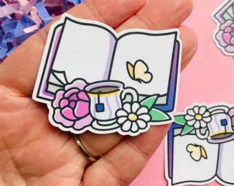 Adesivo de vinil resistente à água com estampa de livro aberto de primavera e flores.