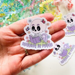 Reading in Peace sticker, Cute Skeleton Reading a book Sticker, Spooky Reading, Bookish Sparkly Sticker, Spooky Sticker, Kindle Stickers
