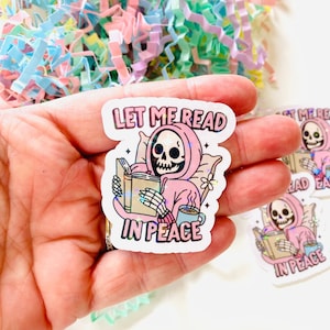 Let me Read in Peace sticker, Skeleton Reading a book Sticker, Spooky Reading, Bookish Sparkly Sticker, Spooky Sticker, Kindle Stickers