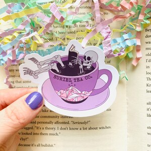 Suriel tea Co. Acotar skeleton reading book Sticker