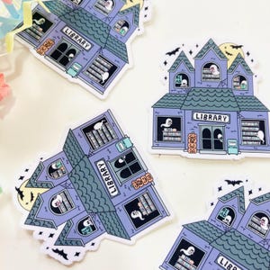 Spooky haunted library laminated die cut sticker