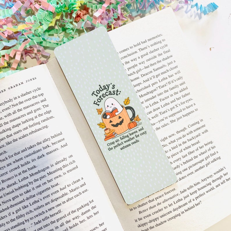 Cute ghost reading a book in a pumpkin cup double sided bookmark