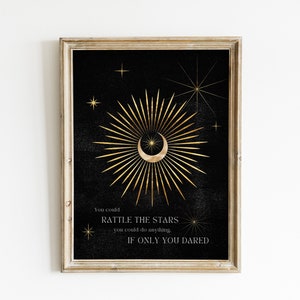 May include: A black and gold printable wall art print with a crescent moon and radiating sunburst design. The text reads "You could rattle the stars you could do anything if only you dared."