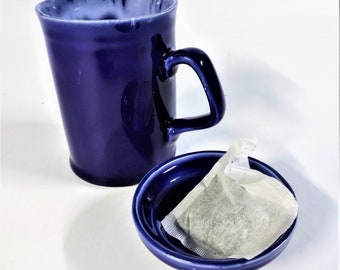 0ne pottery Mug with a tea bag holder / lid glazed in cobalt blue