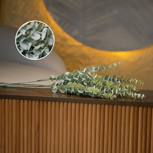 Enhance your decor with the Extra-Long Fake Eucalyptus Branch, a 35" premium artificial greenery perfect for Boho bouquets and wedding decorations.