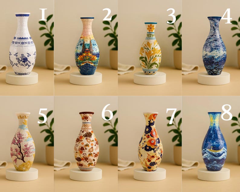 May include: A collection of eight decorative ceramic vases, each with a unique design. The vases vary in shape and color, featuring floral, landscape, and abstract patterns. Each vase is displayed on a small, round, white pedestal.