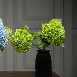 Exquisite faux decor for wedding tables, custom artificial hydrangea bouquets designed as bridal flower arrangements and centerpieces.