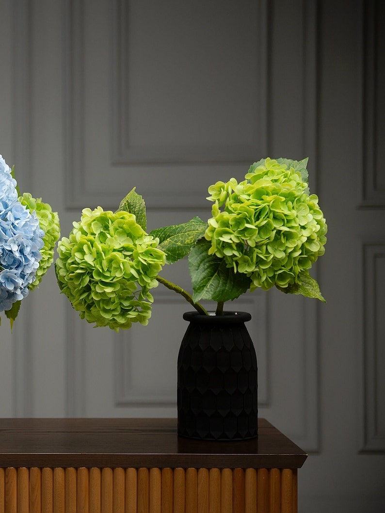 Exquisite faux decor for wedding tables, custom artificial hydrangea bouquets designed as bridal flower arrangements and centerpieces.