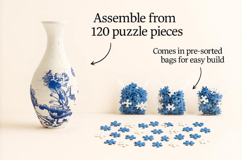 May include: A white vase with blue floral designs stands next to three bags of blue and white puzzle pieces. The text reads "Assemble from 120 puzzle pieces" and "Comes in pre-sorted bags for easy build".