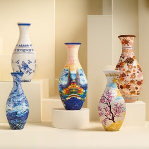 May include: A collection of decorative ceramic vases with various designs. The vases feature blue and white patterns, landscape scenes, floral motifs, and abstract swirls. Each vase has a unique shape and color palette.