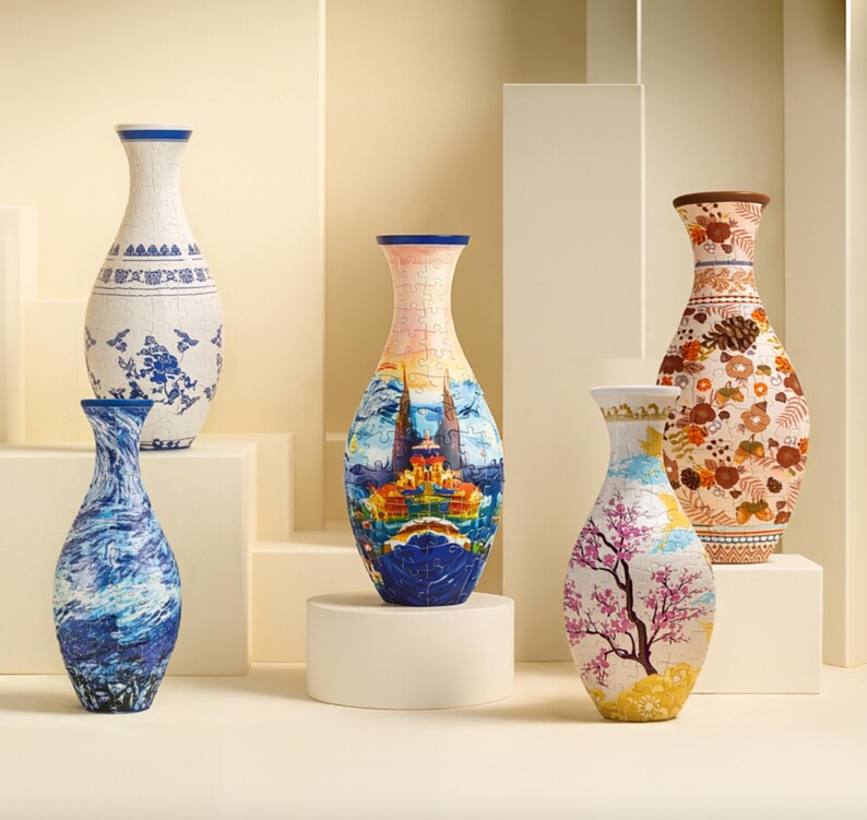 May include: A collection of decorative ceramic vases with various designs. The vases feature blue and white patterns, landscape scenes, floral motifs, and abstract swirls. Each vase has a unique shape and color palette.
