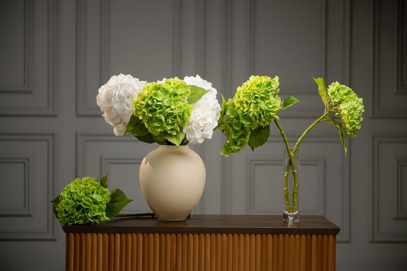 Elegant bridal flower arrangement with custom artificial hydrangeas, perfect for wedding table decoration, faux reception centerpiece.