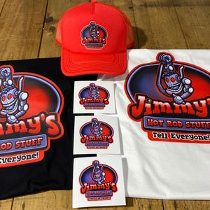 May include: A set of merchandise featuring a robot mascot with the text "Jimmy's Hot Rod Stuff Tell Everyone!"  The set includes a black t-shirt, a white t-shirt, a red trucker hat, and three stickers.