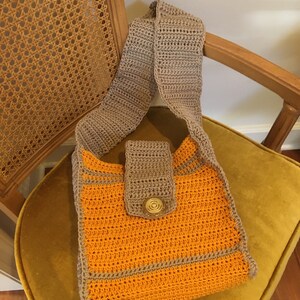 Crochet shoulder bag with China silk lining