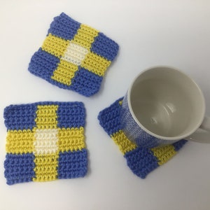 Crochet, blue, yellow, white quilt coasters, set of two
