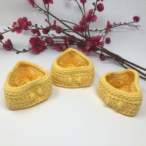 Crochet yellow triangle basket trio