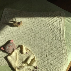 Almond milk white knitted cotton-bamboo baby blanket with kitty snuggle blanket