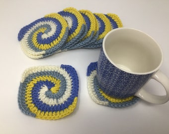 Crochet swirl coasters, set of two, blue, gray, yellow white