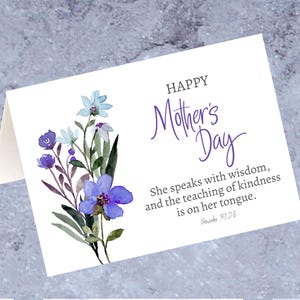 May include: A set of three ceramic mugs with a speckled, matte finish. Each mug features a different color: light blue, cream, and gray. The mugs have a simple, modern design and a comfortable handle.