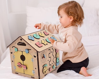 Beschäftigtes Haus mini. Montessori Baby Spielzeug. Beschäftigte Tafel Baby. Sensorikbrett