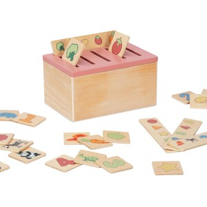 May include: Wooden box with a pink lid and slots for sorting cards. The cards feature images of fruits, vegetables, animals, numbers, and shapes.