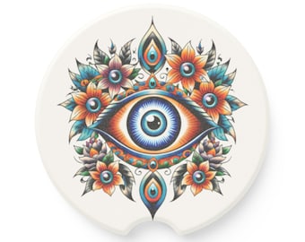 Può includere: Sottobicchiere bianco per auto con un design dettagliato a occhio, iride blu, circondato da fiori arancioni, viola e turchese. L'opera d'arte ha un'estetica ispirata al tatuaggio. Il sottobicchiere ha un ritaglio curvo.