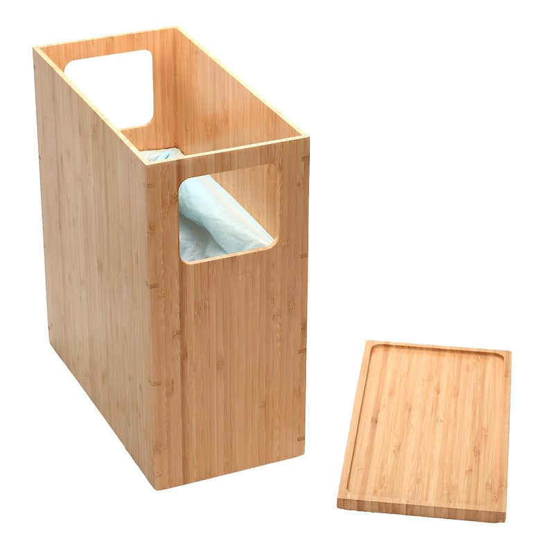 May include: A natural bamboo storage box with a removable lid. The box has a cutout on the front side and is ideal for organizing items.