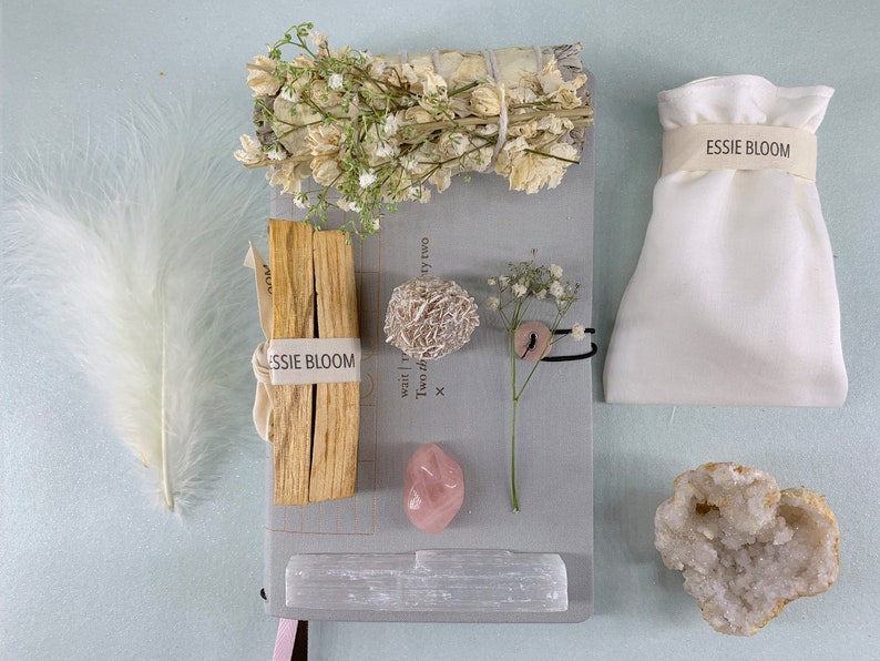 Angel Cleansing Kit with Healing Crystals, White Sage Floral Smudge Stick, Palo Santo and Angel Feathers. image 1