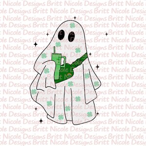 May include: A white ghost with a green shamrock pattern holding a green cup with a straw and a green bag with a rainbow on it.