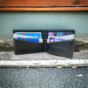 Cartera plegable con forma de cámara de bicicleta