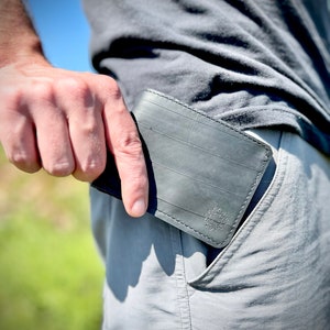 Cartera plegable con cámara de aire para bicicleta