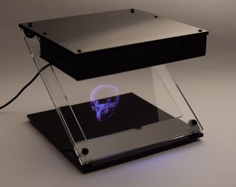 Hologram projector. Futuristic. Display your own .mp4 or .gif animations by copying them on a USB flash drive. Home decoration
