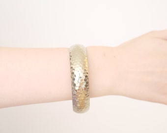 Chunky bangle bracelet, gold tone