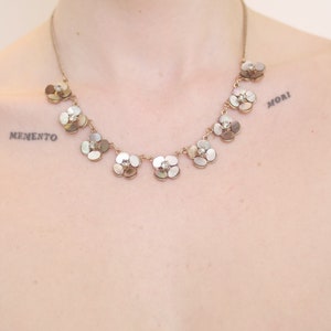Mother of pearl style floral gemstone necklace, rose gold tone