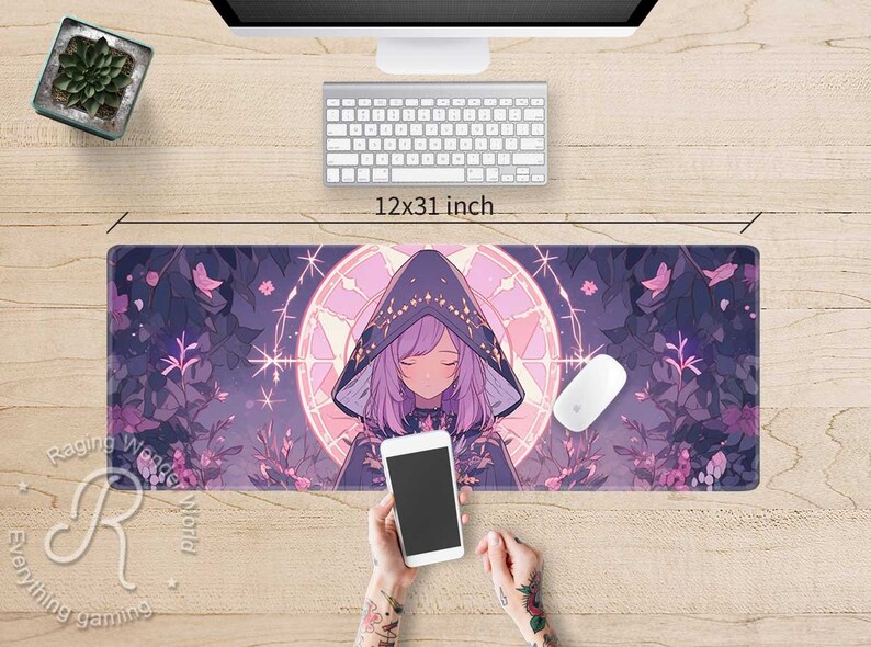 May include: A purple and pink anime-style mouse mat featuring a girl wearing a hooded cloak and a floral design. The mouse mat is 12x31 inches.