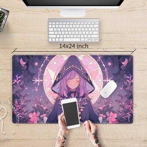 May include: A purple and pink anime-style mouse mat featuring a girl wearing a purple hooded cloak with a glowing circle behind her. The mouse mat is 14x24 inches.