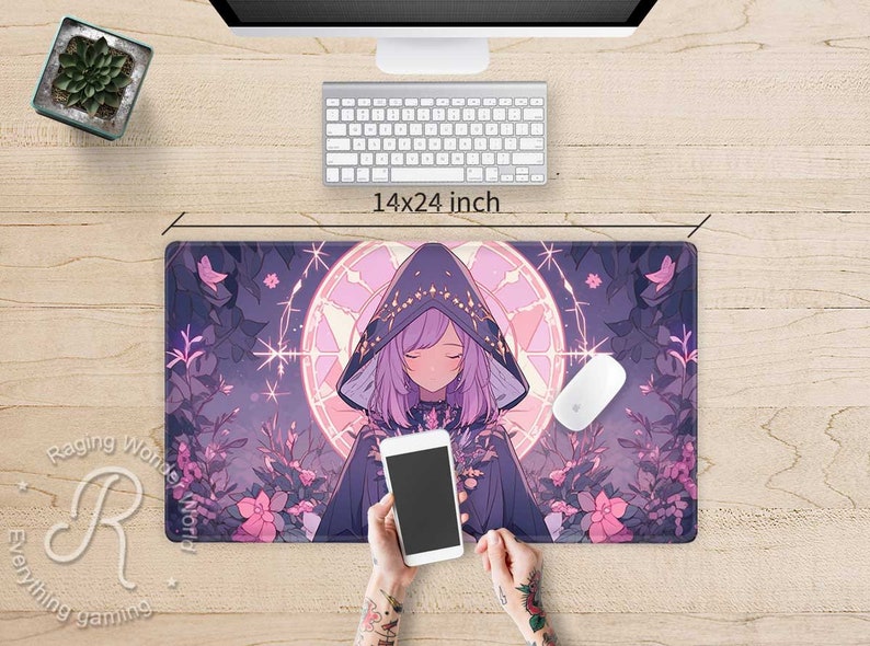 May include: A purple and pink anime-style mouse mat featuring a girl wearing a purple hooded cloak with a glowing circle behind her. The mouse mat is 14x24 inches.