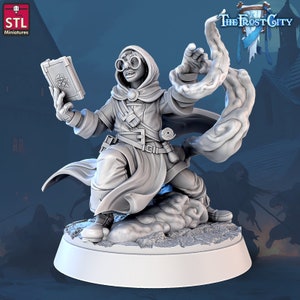 May include: A 3D-printed miniature of a robed figure wearing goggles and a hood, holding a book with a star symbol. The figure is posed dynamically, with one arm raised and a swirling cloud-like effect. The base is round.