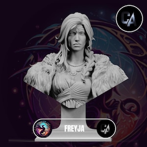 May include: A white painted bust sculpture of a woman with long hair wearing a fur-trimmed cloak. The bust is on a white pedestal with the word "FREYJA" printed on it.
